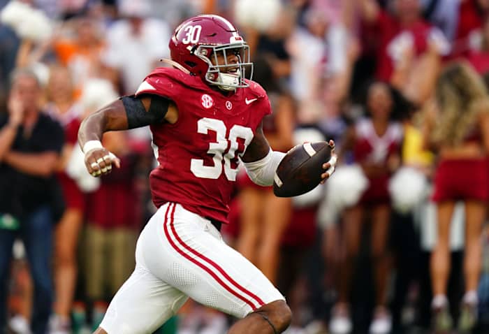 Oct 21, 2023; Tuscaloosa, Alabama, USA; Alabama Crimson Tide linebacker Jihaad Campbell (30) picks up a fumble and ran it back for a touchdown against the Tennessee Volunteers during the second half at Bryant-Denny Stadium.